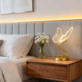 Butterfly-inspired wing table lamp with acrylic panels and adjustable lighting, rechargeable battery powered
