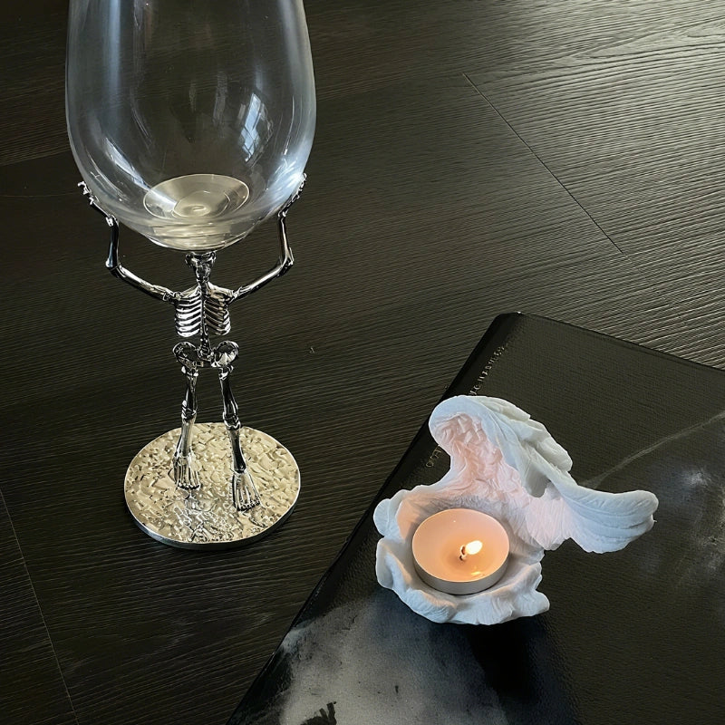 Celestial angel wings resin candle holder with intricate feathered detail and ethereal glow 10