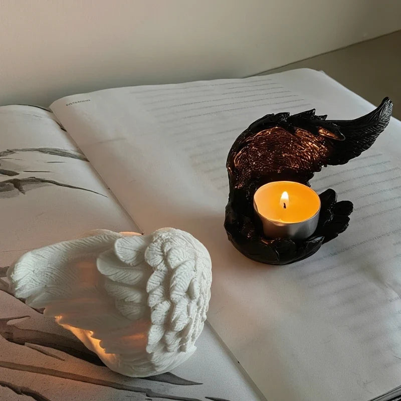 Celestial angel wings resin candle holder with intricate feathered detail and ethereal glow 12