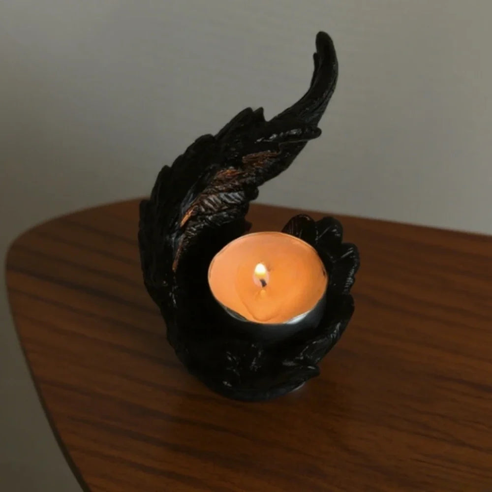 Celestial angel wings resin candle holder with intricate feathered detail and ethereal glow 3