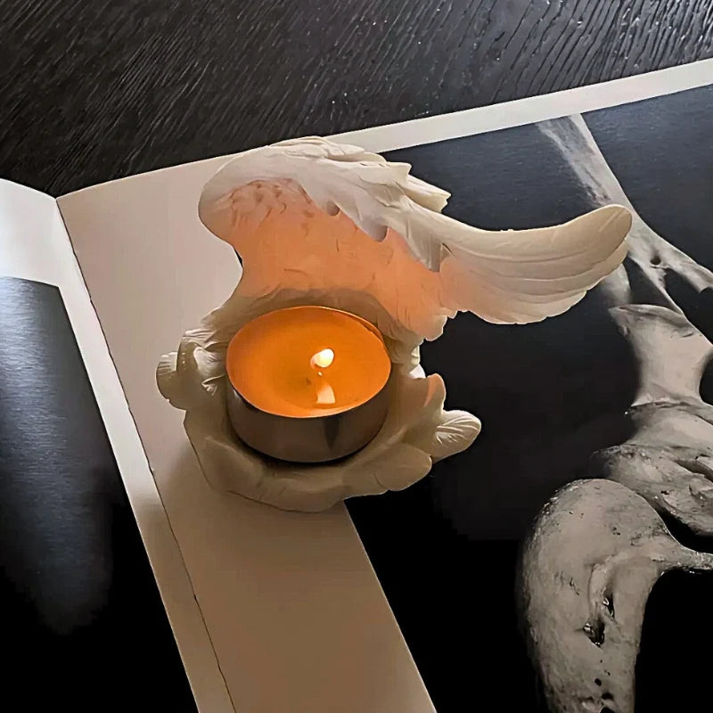Celestial angel wings resin candle holder with intricate feathered detail and ethereal glow 4