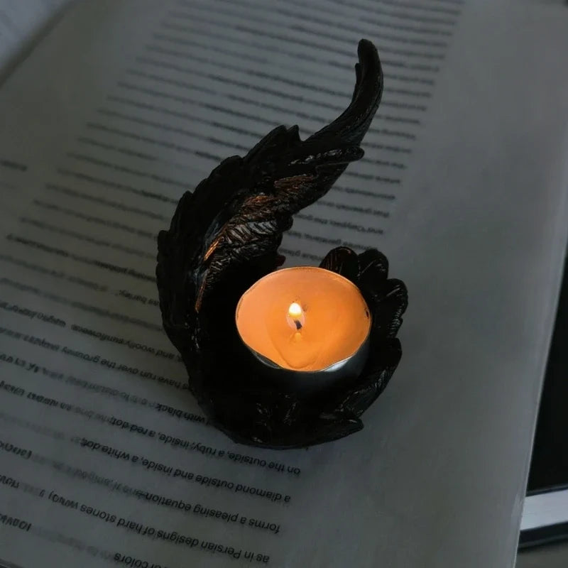 Celestial angel wings resin candle holder with intricate feathered detail and ethereal glow 9