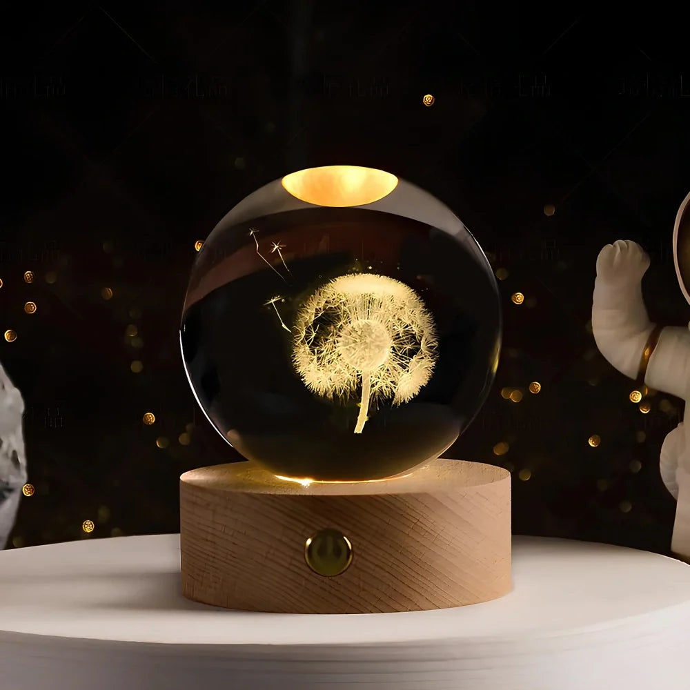 Luminous crystal ball with 3D engraved planets and space scenes, warm white LED glow 13