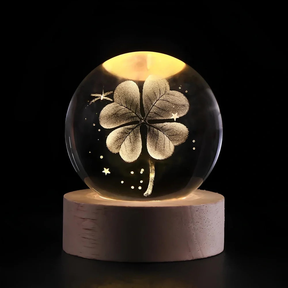 Luminous crystal ball with 3D engraved planets and space scenes, warm white LED glow 16