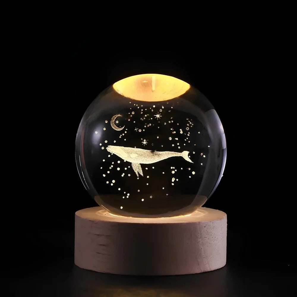 Luminous crystal ball with 3D engraved planets and space scenes, warm white LED glow 19