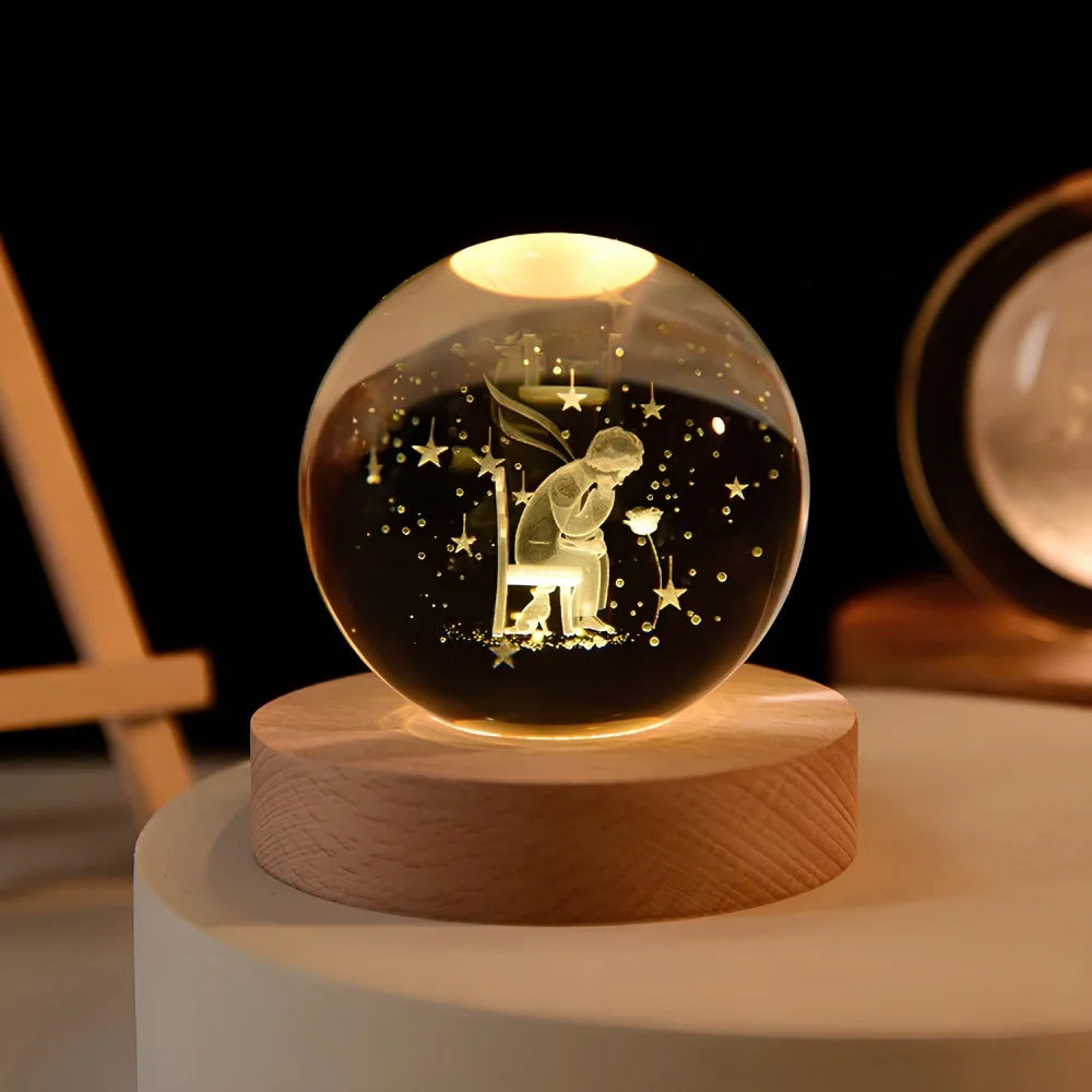 Luminous crystal ball with 3D engraved planets and space scenes, warm white LED glow 20
