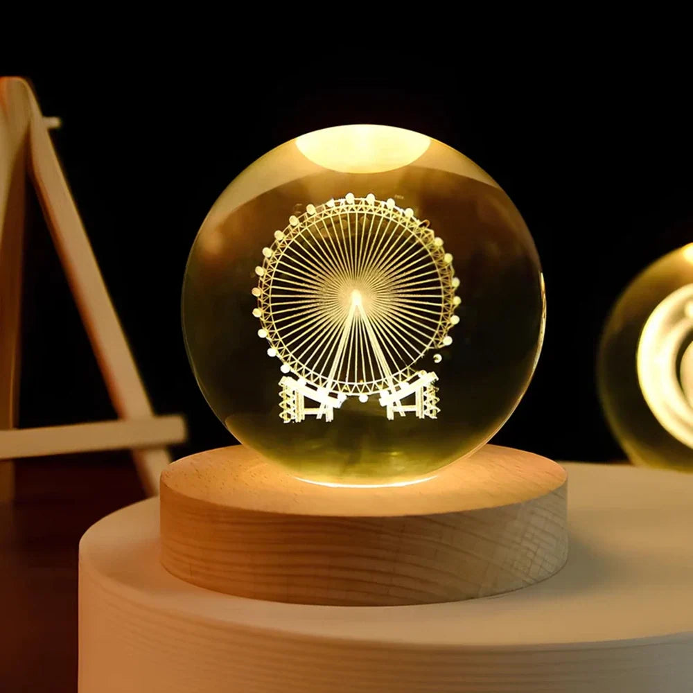 Luminous crystal ball with 3D engraved planets and space scenes, warm white LED glow 22
