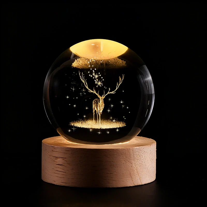 Luminous crystal ball with 3D engraved planets and space scenes, warm white LED glow 23