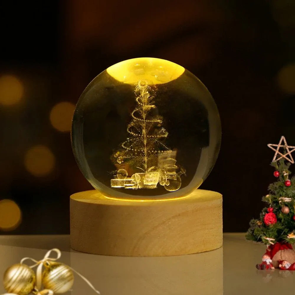 Luminous crystal ball with 3D engraved planets and space scenes, warm white LED glow 24