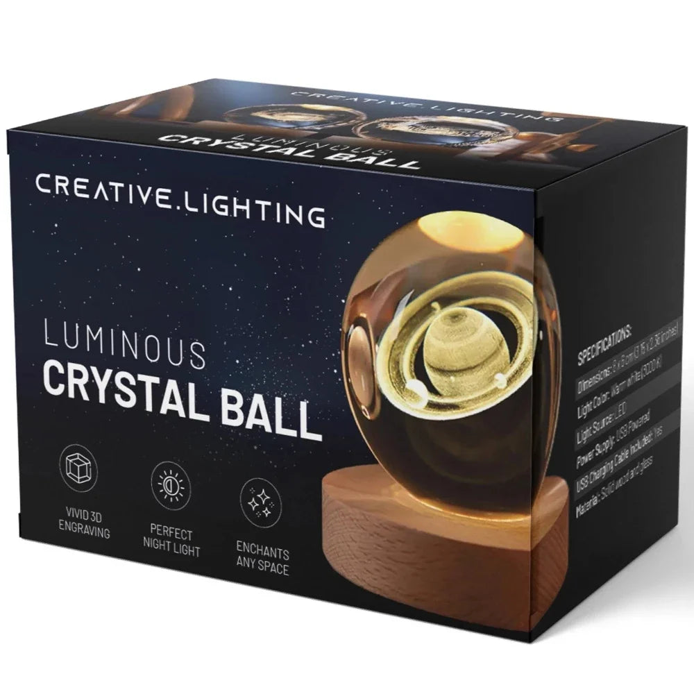 Luminous crystal ball with 3D engraved planets and space scenes, warm white LED glow 29