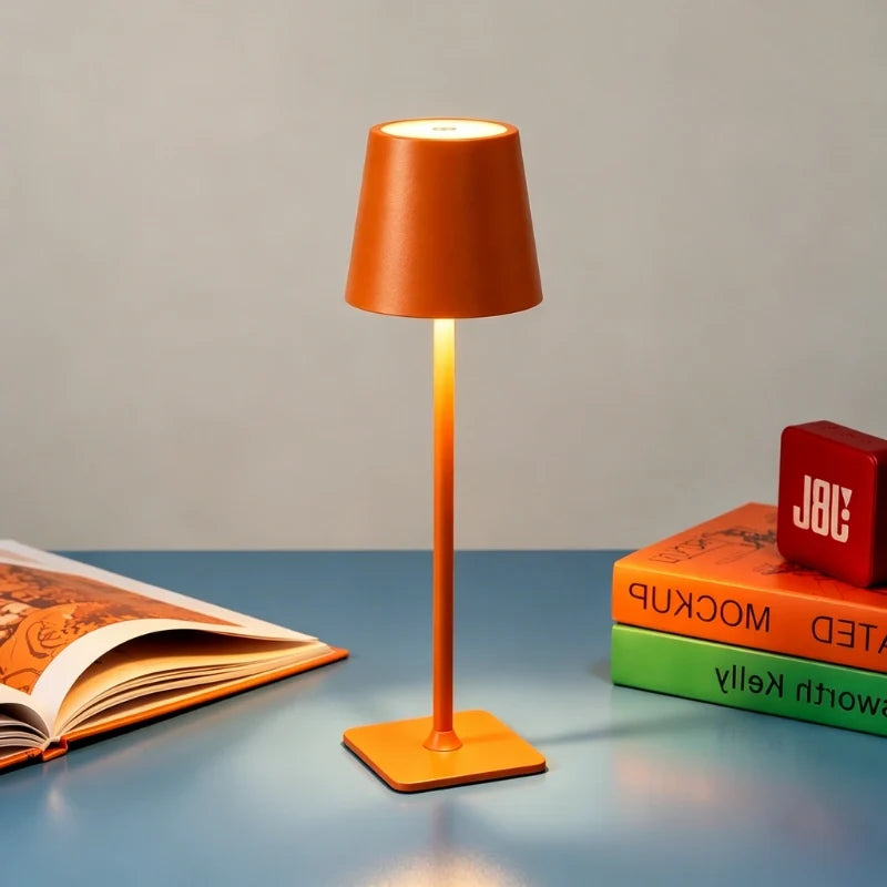 Cordless dimmable tall table lamp with sleek metal stem and warm LED light. 16