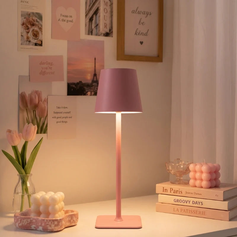 Cordless dimmable tall table lamp with sleek metal stem and warm LED light. 18