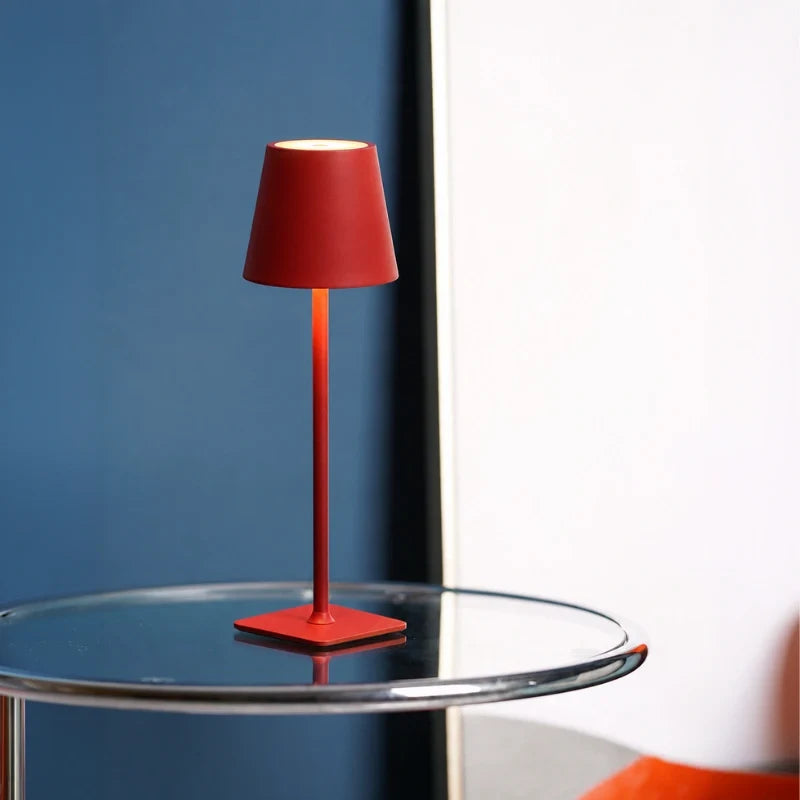 Cordless dimmable tall table lamp with sleek metal stem and warm LED light. 19