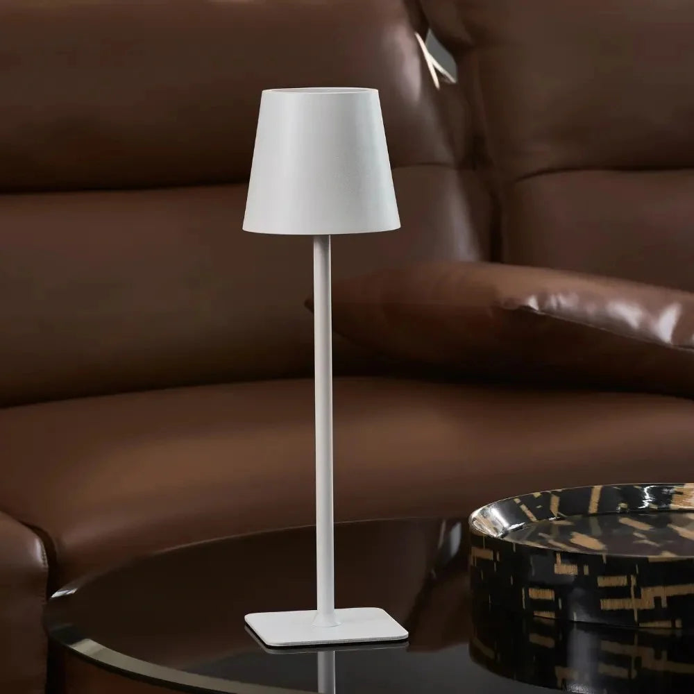 Cordless dimmable tall table lamp with sleek metal stem and warm LED light. 3