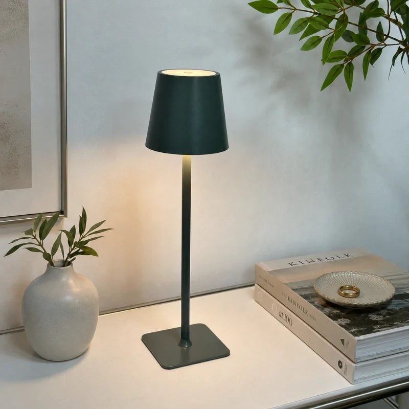 Cordless dimmable tall table lamp with sleek metal stem and warm LED light. 30