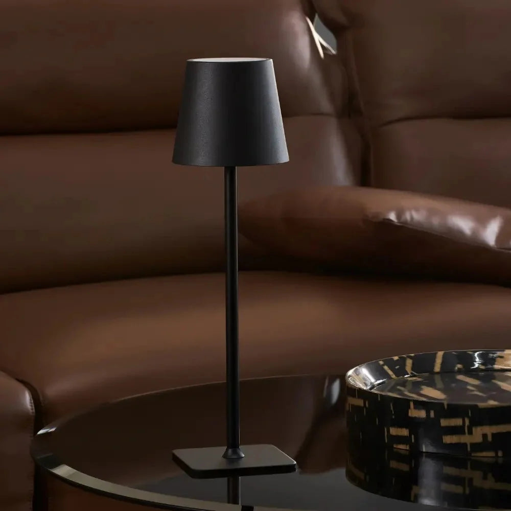 Cordless dimmable tall table lamp with sleek metal stem and warm LED light. 6