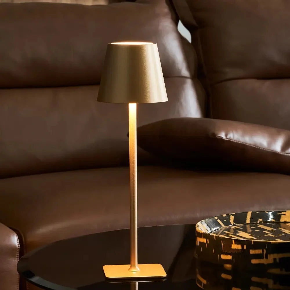 Cordless dimmable tall table lamp with sleek metal stem and warm LED light. 8