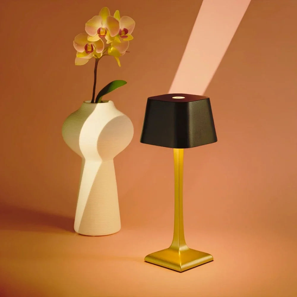 Cordless Eleganza table lamp with minimalist design, dimmable warm white lighting, and 14-16 hour battery life 11