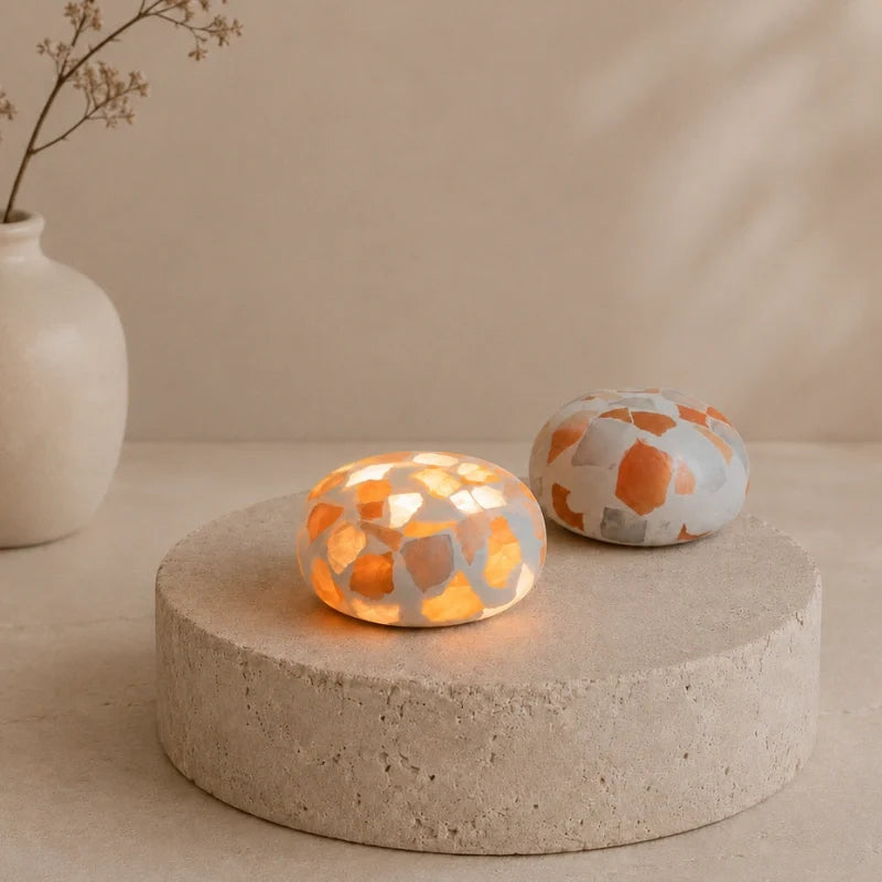 Handcrafted cordless mineral glow lamp with warm ambient light on a table 2