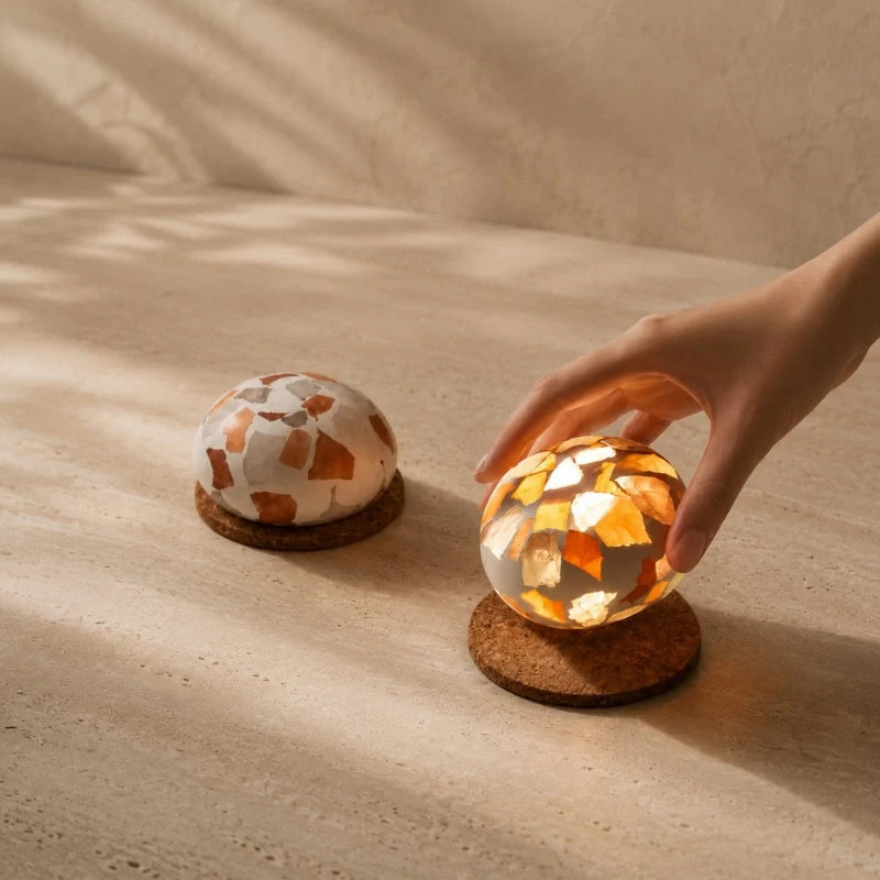 Handcrafted cordless mineral glow lamp with warm ambient light on a table 3