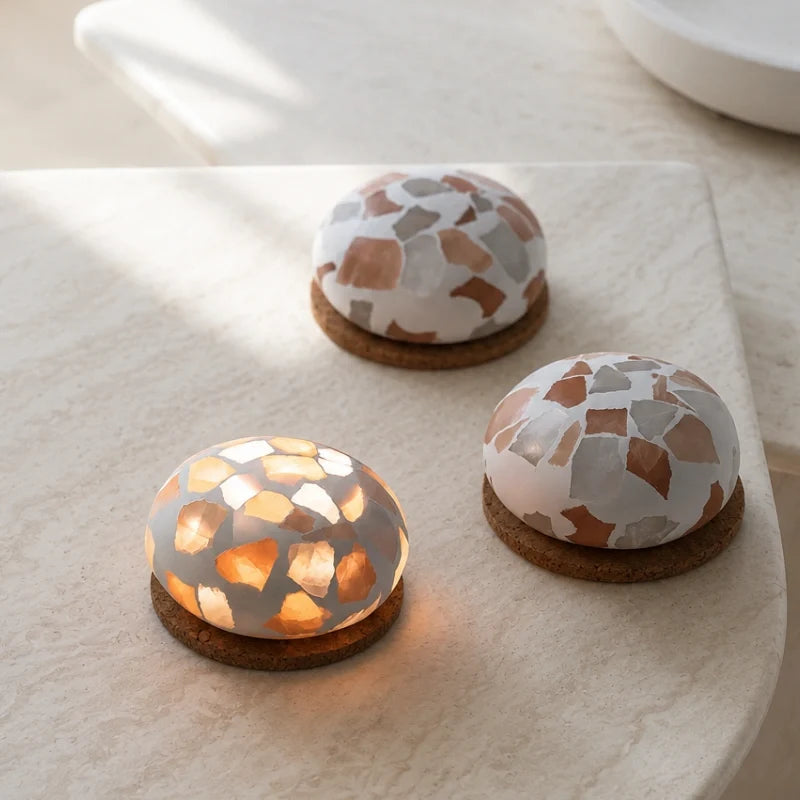 Handcrafted cordless mineral glow lamp with warm ambient light on a table 8