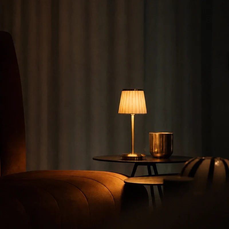 Cordless pleated fabric table lamp with elegant iron base and rechargeable LED lighting 2