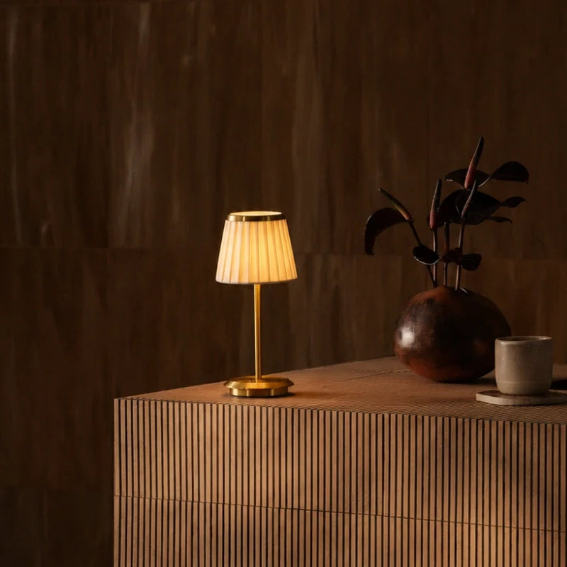Cordless pleated fabric table lamp with elegant iron base and rechargeable LED lighting 3