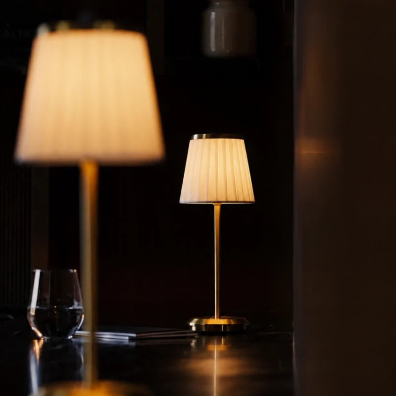 Cordless pleated fabric table lamp with elegant iron base and rechargeable LED lighting 4