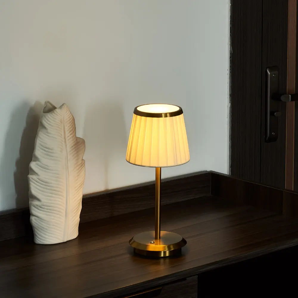 Cordless pleated fabric table lamp with elegant iron base and rechargeable LED lighting 7