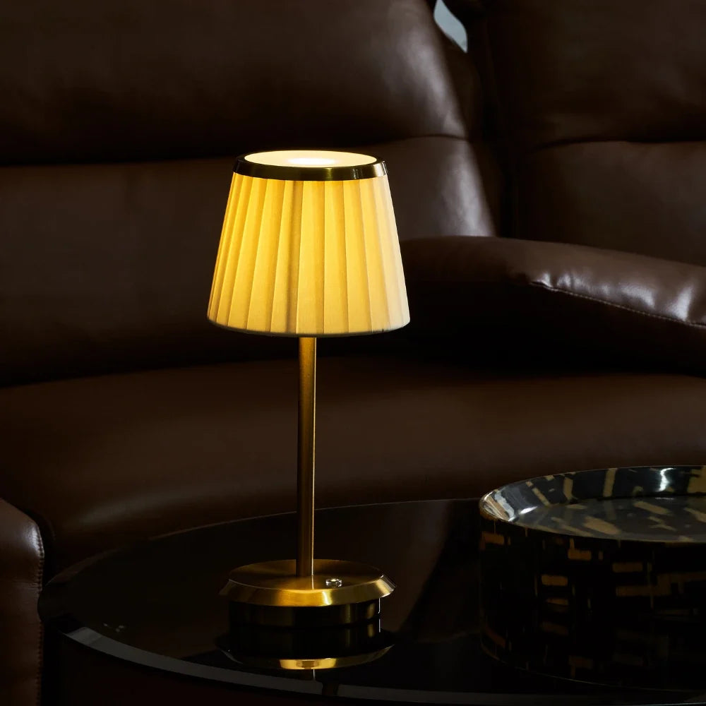Cordless pleated fabric table lamp with elegant iron base and rechargeable LED lighting 8