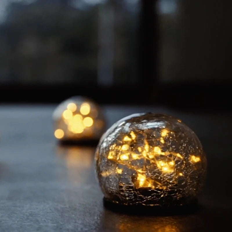 Crackle solar garden orb light with warm white glow and dusk sensor 11