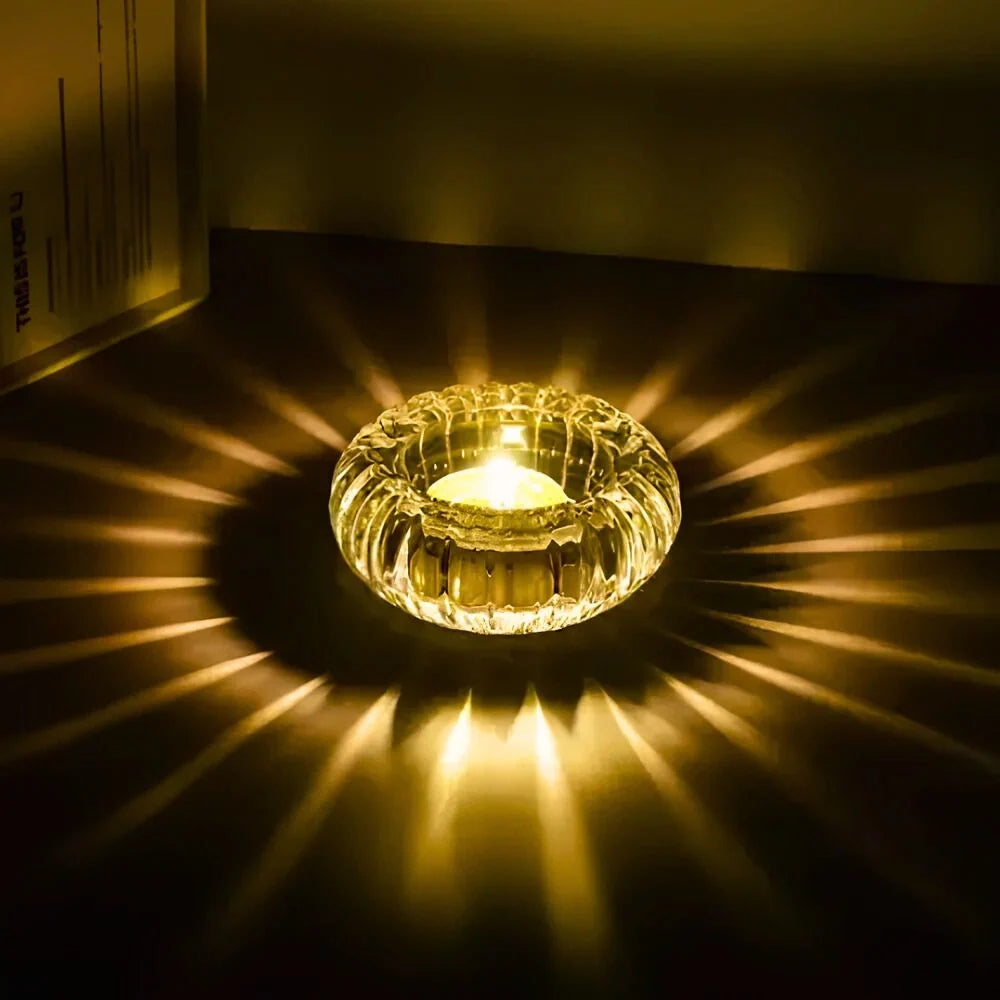 Crystalline GlowRipple candle holder with rippled glass design casting enchanting light reflections 2