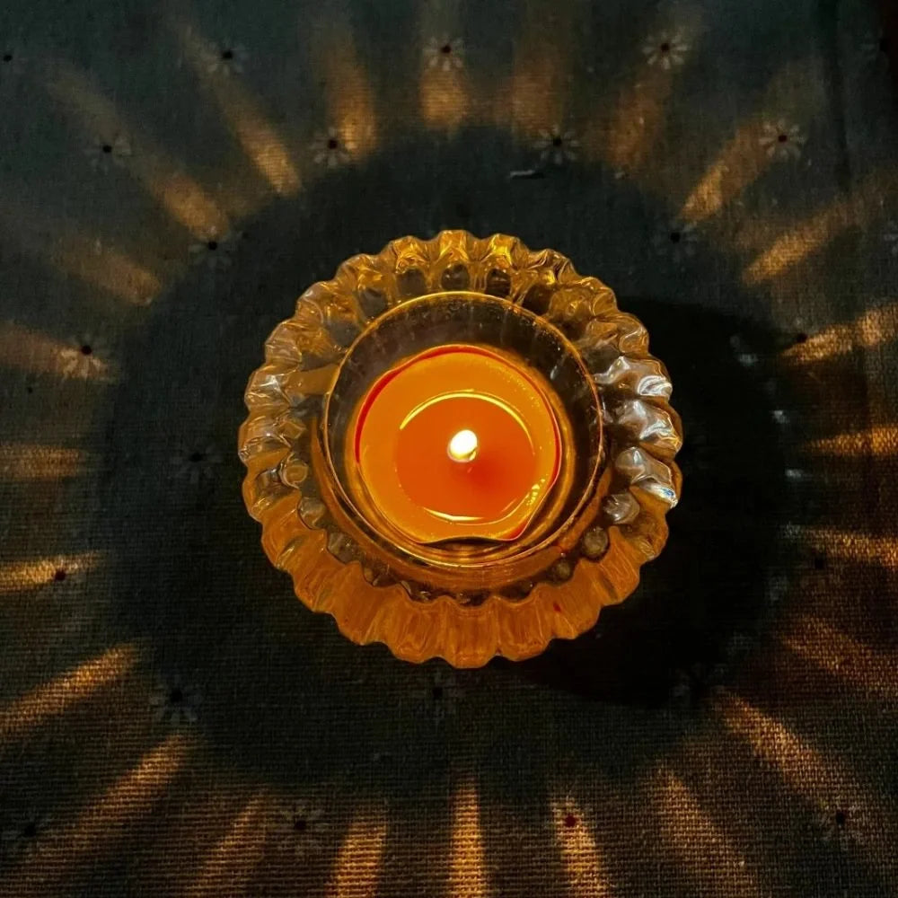 Crystalline GlowRipple candle holder with rippled glass design casting enchanting light reflections 7