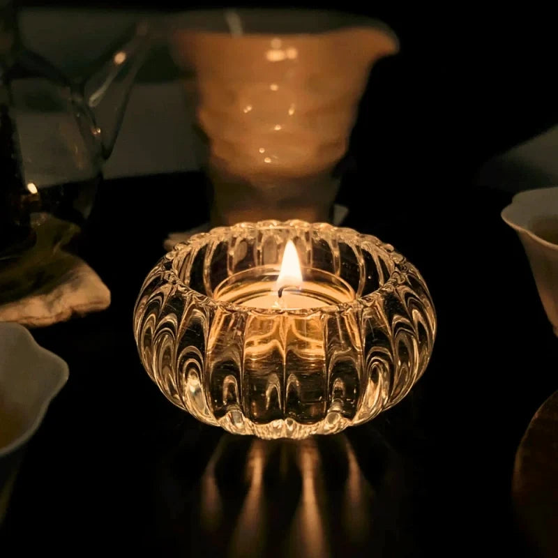 Crystalline GlowRipple candle holder with rippled glass design casting enchanting light reflections 8