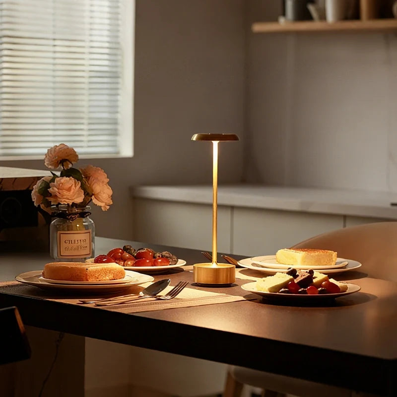Dimmable Luxora table lamp with sleek disc head and cylindrical aluminium base, modern minimalist design 5