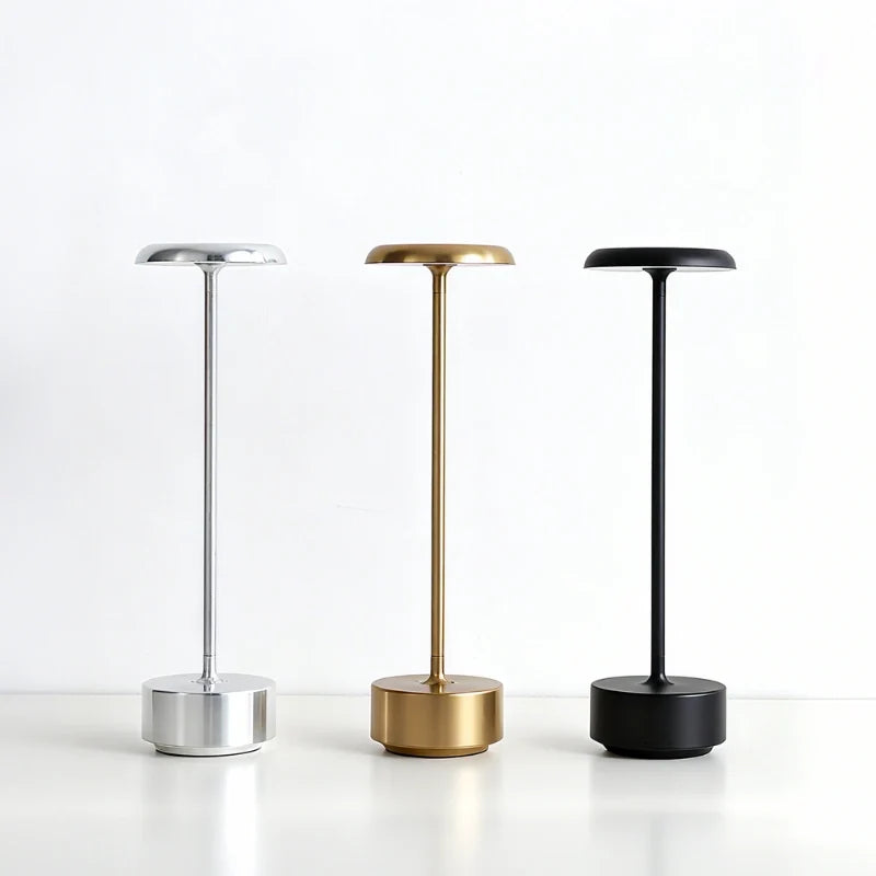 Dimmable Luxora table lamp with sleek disc head and cylindrical aluminium base, modern minimalist design 8