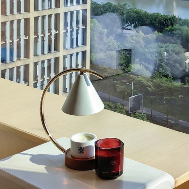 Dimmable Moonveil wax warmer lamp with natural wood base, arched iron frame, and warm white dimmable light 11