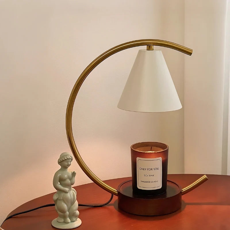 Dimmable Moonveil wax warmer lamp with natural wood base, arched iron frame, and warm white dimmable light 7