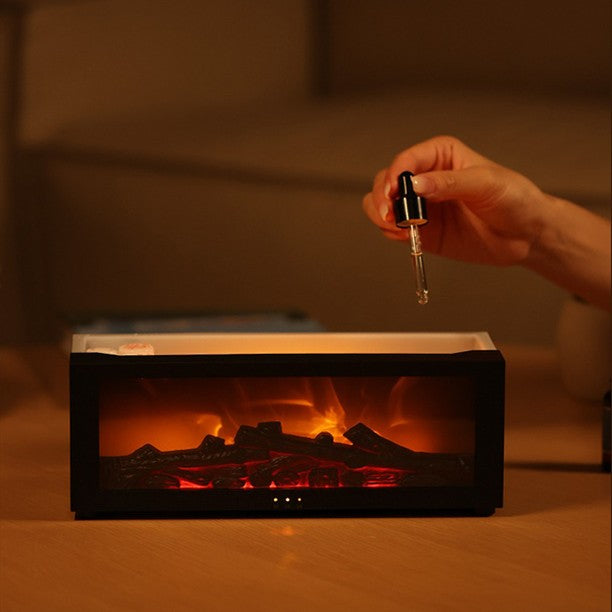 Flame humidifier producing cool mist with realistic fireplace lighting effect on a table 7