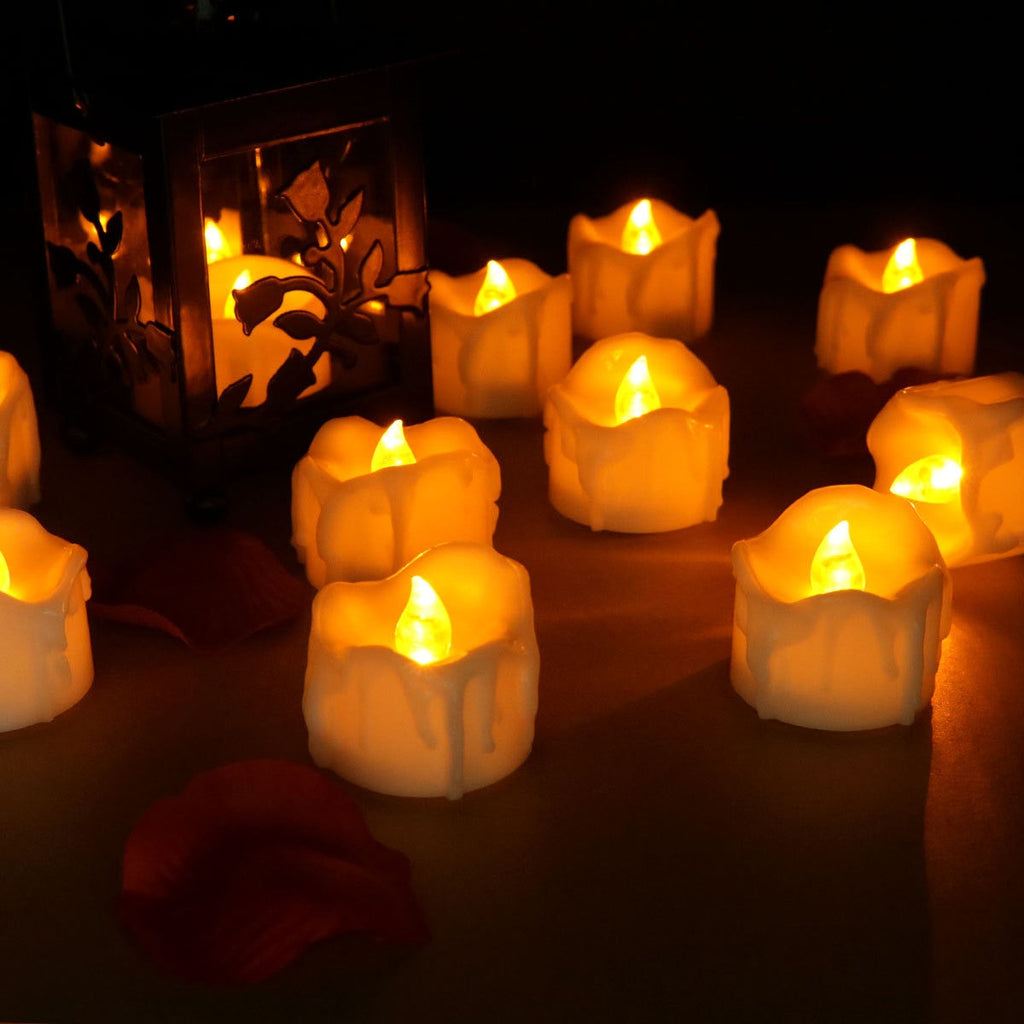 Flickering LED flameless candles with realistic flame effect in warm white, cool white, and yellow colors 2