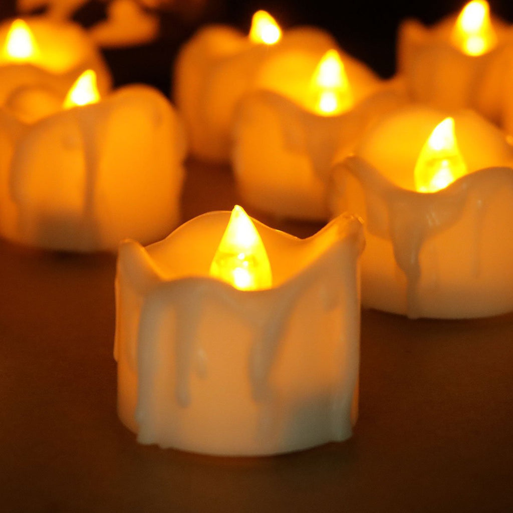 Flickering LED flameless candles with realistic flame effect in warm white, cool white, and yellow colors 5