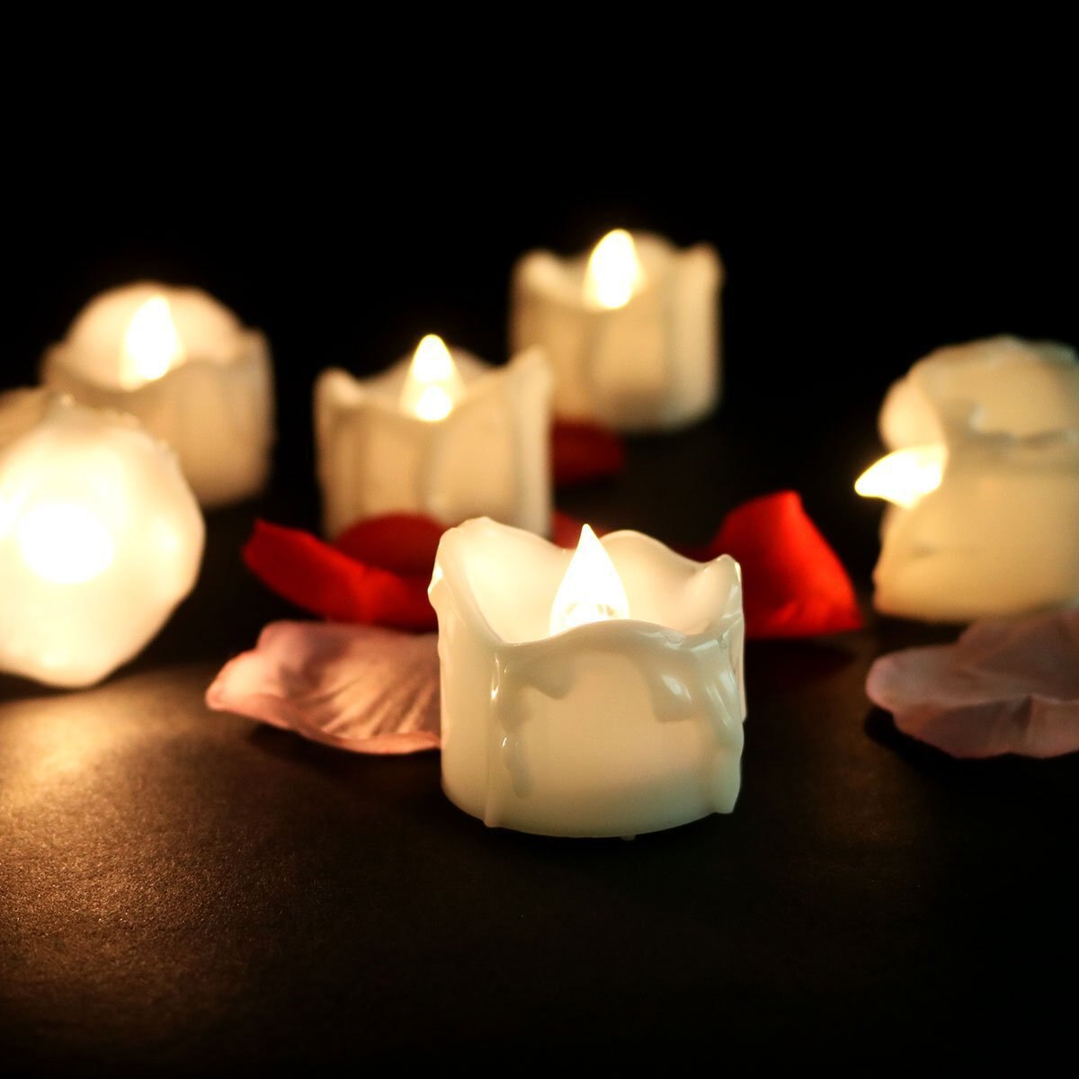 Flickering LED flameless candles with realistic flame effect in warm white, cool white, and yellow colors 8