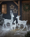 Frosted acrylic reindeer family light-up outdoor Christmas lawn decoration set with 540 cool-white LEDs.