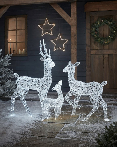 Frosted acrylic reindeer family light-up outdoor Christmas lawn decoration set with 540 cool-white LEDs.