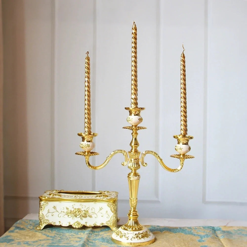 Gilded Nocturne vintage candelabra with adjustable arms and floral detailing in gold alloy