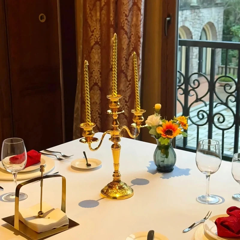 Gilded Nocturne vintage candelabra with adjustable arms and floral detailing in gold alloy 14