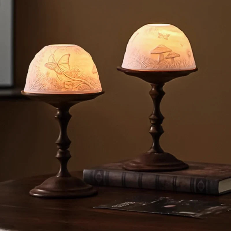 Hand-carved porcelain WhisperDome candle holder with walnut wood base, featuring nature relief design and warm candlelig 2