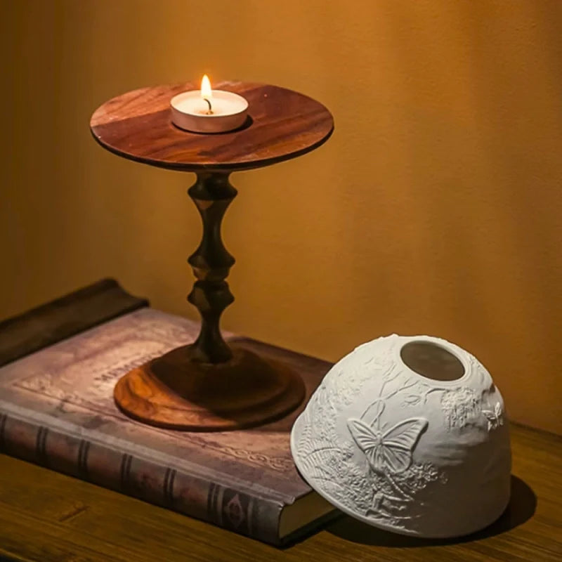 Hand-carved porcelain WhisperDome candle holder with walnut wood base, featuring nature relief design and warm candlelig 4