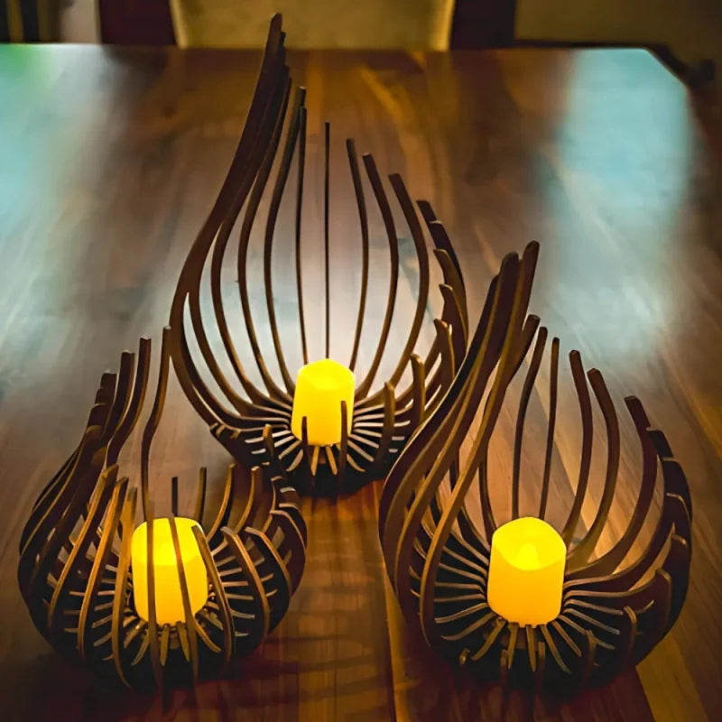 Handcrafted teardrop wooden candle holder with hollow design casting delicate shadows, available in small, medium, and l 10