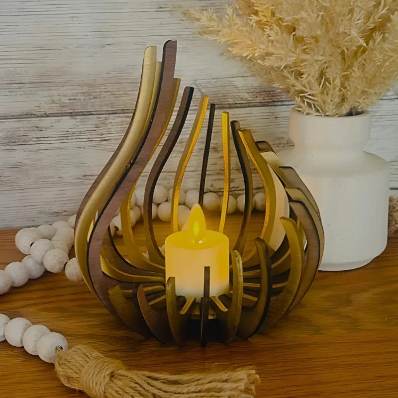 Handcrafted teardrop wooden candle holder with hollow design casting delicate shadows, available in small, medium, and l 11